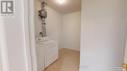 403 - 1499 Nottinghill Gate, Oakville, ON - Indoor Photo Showing Laundry Room