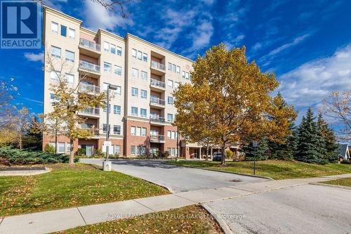 403 - 1499 Nottinghill Gate, Oakville, ON - Outdoor With Facade