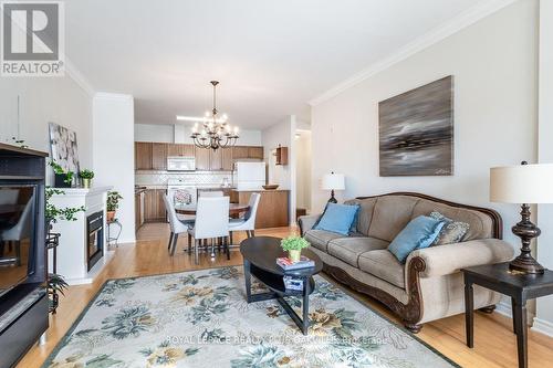 403 - 1499 Nottinghill Gate, Oakville, ON - Indoor Photo Showing Living Room