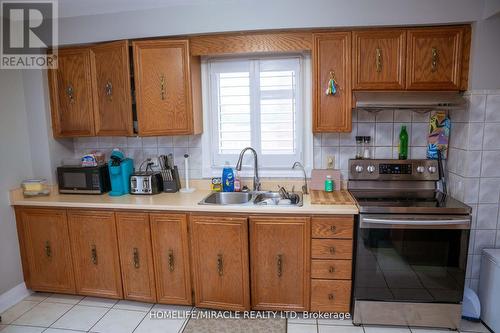 52 Creditstone Road, Brampton, ON - Indoor Photo Showing Kitchen With Double Sink