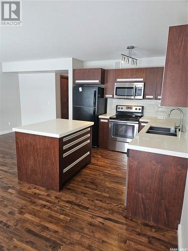 408 1303 Paton Crescent, Saskatoon, SK - Indoor Photo Showing Kitchen With Stainless Steel Kitchen With Double Sink