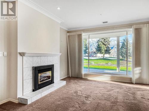 7801 Spartan Drive Unit# 116, Osoyoos, BC - Indoor Photo Showing Living Room With Fireplace