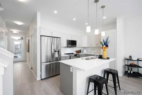 40 Saddle Creek Cove, Winnipeg, MB - Indoor Photo Showing Kitchen With Double Sink With Upgraded Kitchen