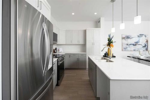 40 Saddle Creek Cove, Winnipeg, MB - Indoor Photo Showing Kitchen With Double Sink With Upgraded Kitchen