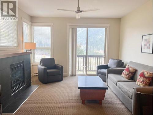 2049 Summit Drive Unit# 311D, Panorama, BC - Indoor Photo Showing Living Room With Fireplace