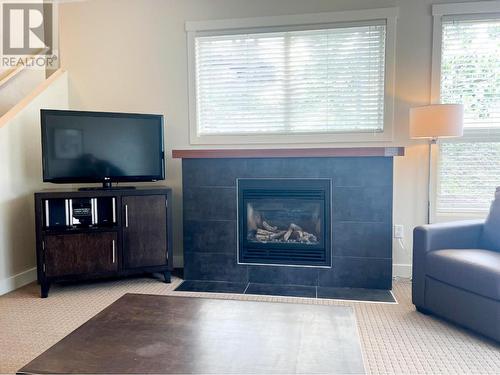 2049 Summit Drive Unit# 311D, Panorama, BC - Indoor Photo Showing Living Room With Fireplace