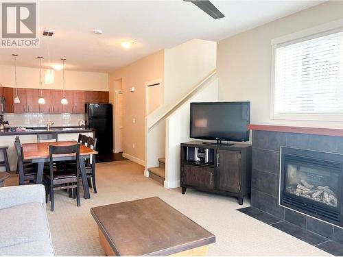 2049 Summit Drive Unit# 311D, Panorama, BC - Indoor Photo Showing Living Room With Fireplace