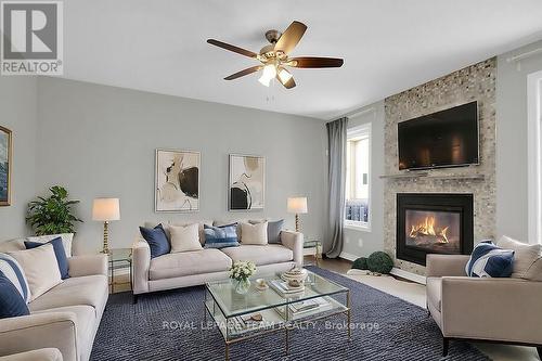 371 Meadowbreeze Drive, Ottawa, ON - Indoor Photo Showing Living Room With Fireplace