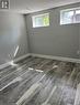 Unfurnished room featuring dark hardwood / wood-style flooring and a wealth of natural light - 155 Norfolk Avenue, Cambridge, ON  - Indoor Photo Showing Other Room 