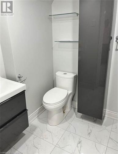 Bathroom featuring vanity and toilet - 155 Norfolk Avenue, Cambridge, ON - Indoor Photo Showing Bathroom