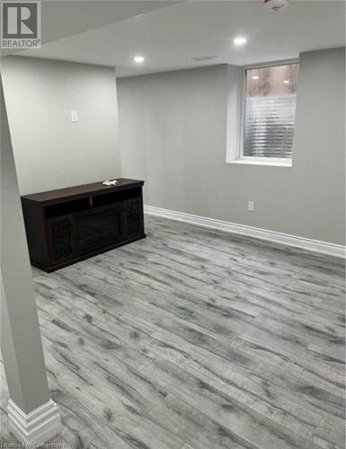 Basement with light hardwood / wood-style flooring - 155 Norfolk Avenue, Cambridge, ON - Indoor Photo Showing Other Room