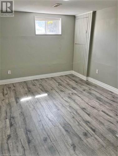 Unfurnished room featuring light hardwood / wood-style flooring - 155 Norfolk Avenue, Cambridge, ON - Indoor Photo Showing Other Room