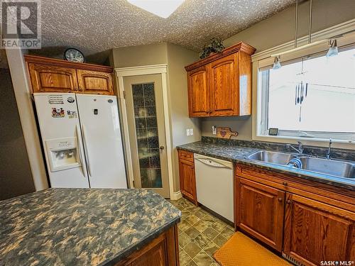 119 Wells Avenue E, Langenburg, SK - Indoor Photo Showing Kitchen With Double Sink