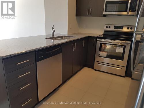 413 - 7325 Markham Road, Markham, ON - Indoor Photo Showing Kitchen With Stainless Steel Kitchen With Double Sink