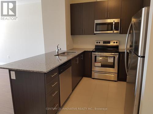 413 - 7325 Markham Road, Markham, ON - Indoor Photo Showing Kitchen With Stainless Steel Kitchen With Double Sink