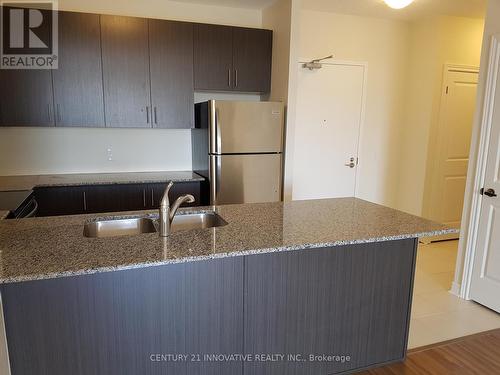 413 - 7325 Markham Road, Markham, ON - Indoor Photo Showing Kitchen With Double Sink