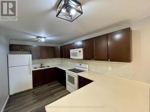 50 - 1016 Falgarwood Drive, Oakville, ON - Indoor Photo Showing Kitchen With Double Sink