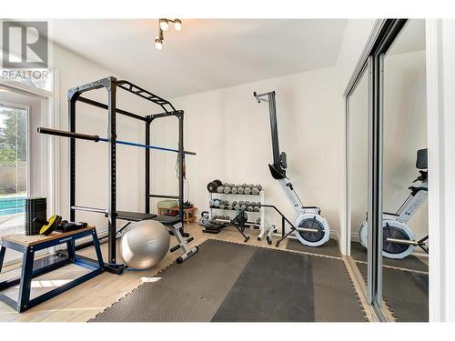 Bedroom used as Gym. - 465 Okaview Road, Kelowna, BC - Indoor Photo Showing Gym Room