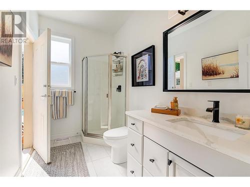 Bathroom on Main With Exit to Pool Area. - 465 Okaview Road, Kelowna, BC - Indoor Photo Showing Bathroom