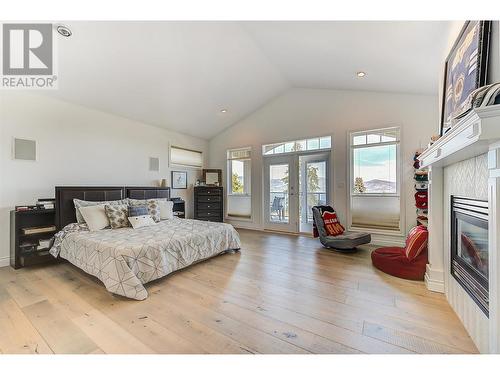 465 Okaview Road, Kelowna, BC - Indoor Photo Showing Bedroom With Fireplace