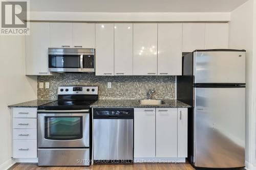 405 - 15 Bruyeres Mews, Toronto, ON - Indoor Photo Showing Kitchen With Upgraded Kitchen