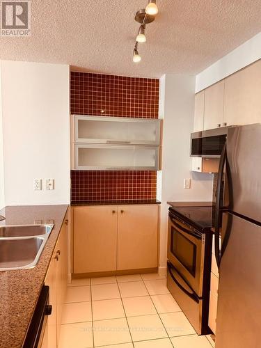 3207 - 11 Brunel Court, Toronto, ON - Indoor Photo Showing Kitchen With Double Sink