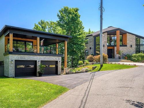 Garage - 1000 Rue Des Tournesols, Sainte-Adèle, QC - Outdoor With Deck Patio Veranda With Exterior