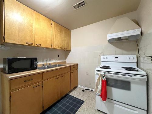 185 Market Street, Thunder Bay, ON - Indoor Photo Showing Kitchen With Double Sink