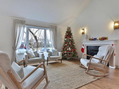 Den - 175 Rue Maxime, Saint-Jean-Sur-Richelieu, QC - Indoor Photo Showing Living Room With Fireplace