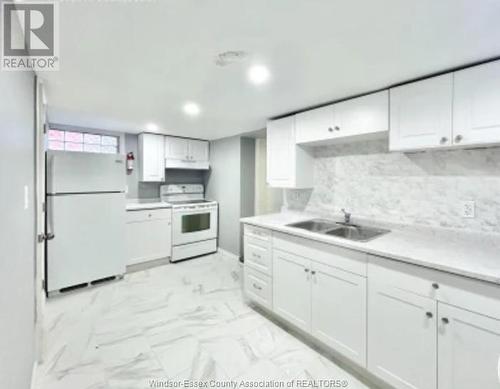 1167 Isabelle Place, Windsor, ON - Indoor Photo Showing Kitchen With Double Sink