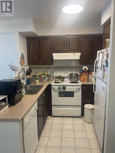 2010 - 23 Lorraine Drive, Toronto, ON - Indoor Photo Showing Kitchen With Double Sink