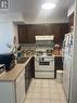 2010 - 23 Lorraine Drive, Toronto, ON  - Indoor Photo Showing Kitchen With Double Sink 