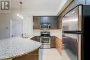 807 - 760 Sheppard Avenue W, Toronto, ON  - Indoor Photo Showing Kitchen With Stainless Steel Kitchen With Double Sink 