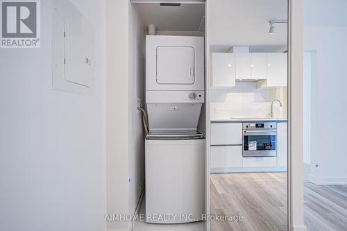 2412 - 230 Simcoe Street, Toronto, ON - Indoor Photo Showing Laundry Room