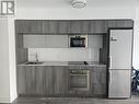 911 - 575 Bloor Street E, Toronto, ON  - Indoor Photo Showing Kitchen 