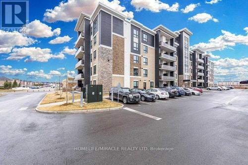 506 - 620 Sauve Street, Milton, ON - Outdoor With Balcony With Facade