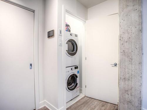 Salle de lavage - 407-5388 Boul. Henri-Bourassa O., Montréal (Saint-Laurent), QC - Indoor Photo Showing Laundry Room