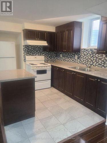 Bsmt - 21 Rouge Street, Brampton, ON - Indoor Photo Showing Kitchen With Double Sink