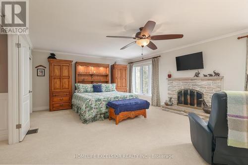 12 Bristol Sands Crescent, Uxbridge, ON - Indoor Photo Showing Bedroom With Fireplace