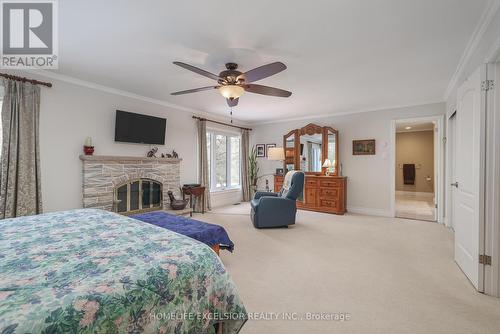 12 Bristol Sands Crescent, Uxbridge, ON - Indoor Photo Showing Bedroom With Fireplace