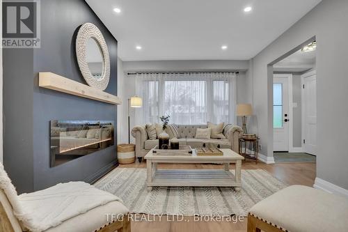 1125 Venus Crescent, Oshawa (Lakeview), ON - Indoor Photo Showing Living Room With Fireplace