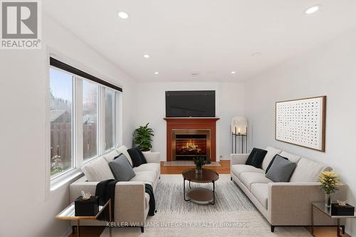 2112 Gardenway Drive, Ottawa, ON - Indoor Photo Showing Living Room With Fireplace