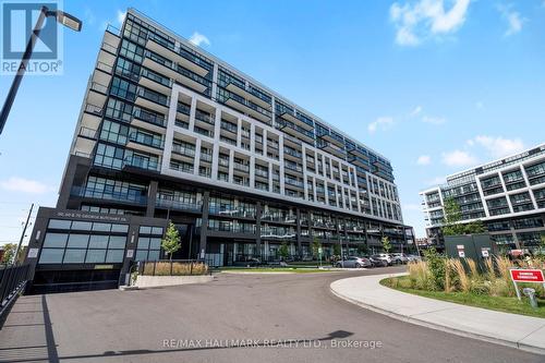 118 - 50 George Butchart Drive, Toronto, ON - Outdoor With Facade