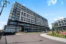 118 - 50 George Butchart Drive, Toronto, ON  - Outdoor With Facade 