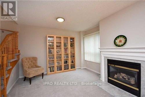 5 - 5525 Palmerston Crescent, Mississauga, ON - Indoor Photo Showing Living Room With Fireplace