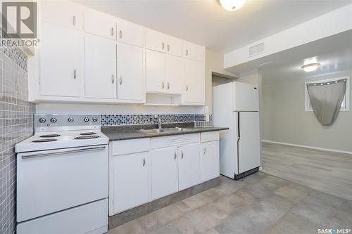 1617 19Th Street W, Saskatoon, SK - Indoor Photo Showing Kitchen With Double Sink