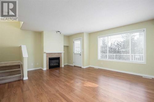 1, 240 Laffont Way, Fort Mcmurray, AB - Indoor Photo Showing Other Room With Fireplace