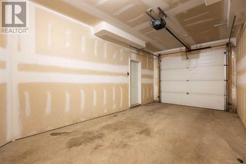 1, 240 Laffont Way, Fort Mcmurray, AB - Indoor Photo Showing Garage