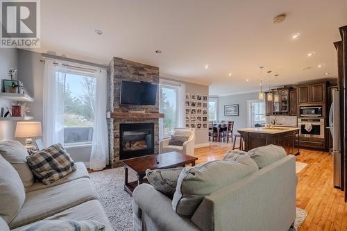 22 Micnoel Place, Pouch Cove, NL - Indoor Photo Showing Living Room With Fireplace