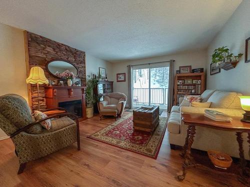 122/124-1051 Gerry Sorensen Way, Kimberley, BC - Indoor Photo Showing Living Room With Fireplace